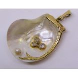 Naturalistic shell pendant set with a trefoil cluster of diamonds, mount tests as unmarked 18ct