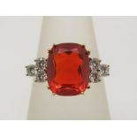 Art Deco style fire opal and diamond ring, marks worn, tests as 18ct gold, size N, 5g