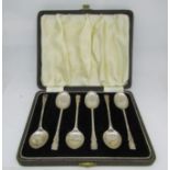 A cased set of six silver tea spoons in a pronounced art deco style, Birmingham 1923