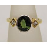 18ct bi-colour gold green sapphire and diamond ring, maker S M, size N/O, 5g