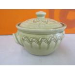 Mike Dodd studio pottery twin handled lidded pot, with celadon glaze and incised wavy banded