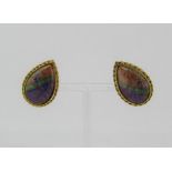 Pair of pear cut black opal clip earrings by Pippa Ramsay Rae, unmarked, test as 18ct gold, in
