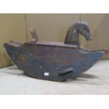 A primitive painted child's rocking horse