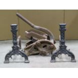 A pair of Antique gothic heavy cast iron fire dogs initialed S and F 38cm high together with a
