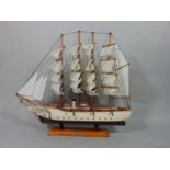 A model of the USS Cutter Eagle, with four mast, complete with rigging and sail, launched 1936