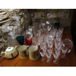 A collection of glassware including Stuart crystal drinking glasses, six various decanters and