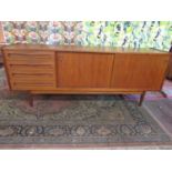 Good quality 1960s Danish teak sideboard, fitted with four long drawers and two slide doors