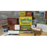 A collection of vintage tins, together with a number of games including a bone and ebony domino