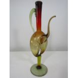 Rare and interesting Venetian glass ewer, with worked glass handle and spout, upon a thick foot with