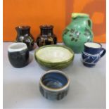 A mixed collection of studio pottery comprising a blue glazed jug, possibly by Michael Casson, a