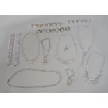 Collection of silver and cubic zirconia jewellery comprising bracelets, necklaces and rings *Please
