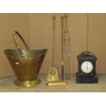 A Victorian black slate and marble domed top mantle clock, the circular enamelled dial with Roman
