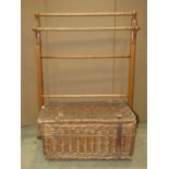 A vintage wicker laundry basket, together with a Victorian ash-wood towel rail