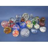 A large collection of paperweights in various bubbled and latticino decoration (22)