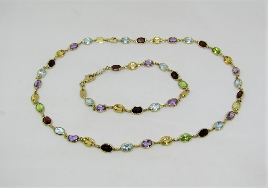 18ct multi gem set necklace and matching bracelet, can also be worn as a longer necklace, clasps