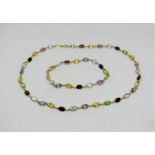 18ct multi gem set necklace and matching bracelet, can also be worn as a longer necklace, clasps
