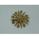 Antique 9ct seed pearl starburst brooch / pendant, 5.2g