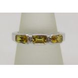 Yellow sapphire and diamond ring, unmarked, tests as 18ct white gold, size N, 6.3g