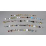 Large collection of silver dress rings of varied design, to include two opal examples, most