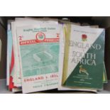 A box containing a quantity of England Rugby Union programmes - various dates from the 1960s