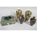 A cloisonné enamel box with pierced lid, a pair of cloisonné ovi-form vases and a pair of Japanese