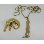 14k panther pendant, 3.7g and a 9ct erotic pendant on box link chain, 7g (2)