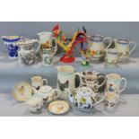 A collection of ceramics relating to poultry including three graduated Brixton pottery jugs, further
