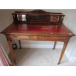 A late 19th century mahogany ladies writing desk fitted with two frieze drawers, raised on square