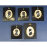 Five 19th century silhouette portraits, oval, in traditional ebonised frames