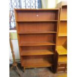 Bornholm Danish teak bookcase upon four circular tapered feet, 183cm high x 100cm long