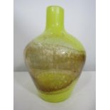 A good quality heavy glass baluster vase with mottled yellow and brown stripes, 33cm high