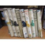 A collection of nine Hugh Lofting books, seven with original dust wrappers and including Doctor