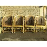 A set of four Bergere tub chairs, with horseshoe shaped backs, gilt finish and barley twist supports