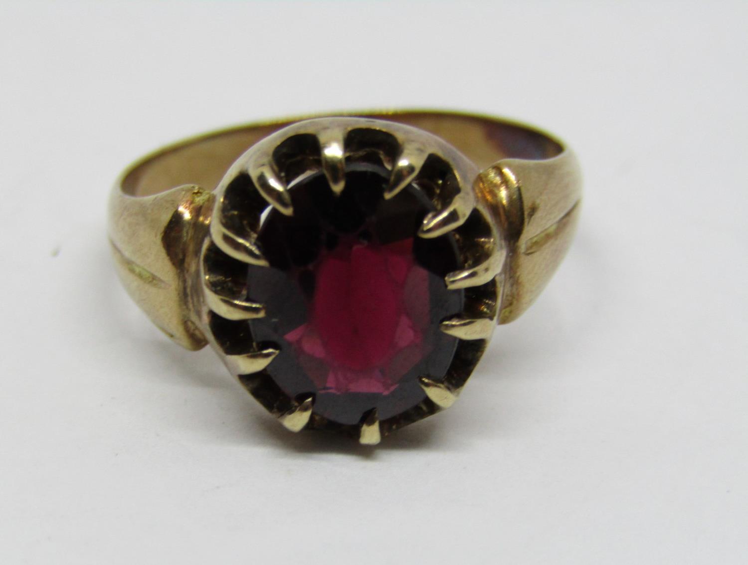 9ct claw set garnet ring, size N and an antique 15ct brooch set with a pink ruby, 13.7g total (2) - Image 4 of 4