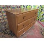 Ercol light elm three drawer chest, 68cm high x 91cm wide