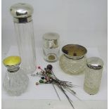 Five cut glass and silver topped jars, one with yellow enamelled detail, plus a selection of hat