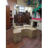 Unusual curved art deco fumed oak dressing table with triptych mirror over an arched base with