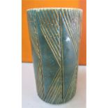 Interesting Poole Pottery cylinder vase with green over glaze and incised geometric decoration, 23cm