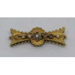 Antique yellow metal pearl and diamond brooch with beaded border, 4.5cm wide approx, 6.7g