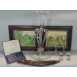 A Victorian clear glass epergne, the circular base supporting four fluted trumpets together with a