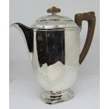 A four piece silver tea and coffee set, with milk/cream jug and sugar bowl, each of elongated