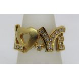 18ct diamond set 'LOVE' ring, size P/Q, 10.2g