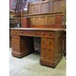 A Victorian mahogany kneehole twin pedestal desk/dressing table, the lower section enclosed by an