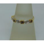 18ct sapphire and diamond half hoop ring, size O/P, 1.9g