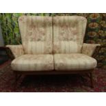 Ercol Golden Dawn two seater sofa with spindle back, 141cm long x 100cm high