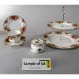 A collection of Royal Albert Old Country Roses pattern wares comprising a two tier cake stand,