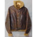 Irvin type flying jacket, probably WW2, in brown leather with sheepskin lining. Tailored leather