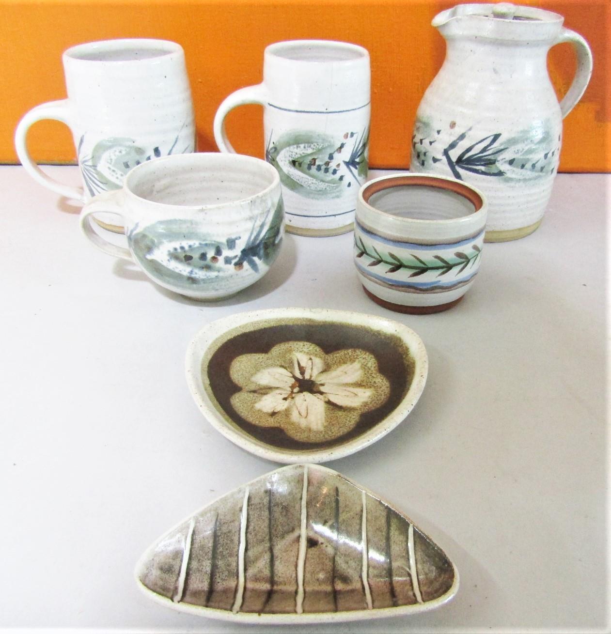 Marianne De Trey - Collection of stoneware studio pottery comprising two tankards, mug and jug all