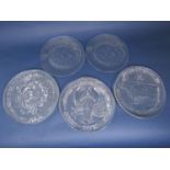 A collection of Scandinavian glass plates to include a pair of Kosta plates decorated with Plaice,