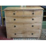 A Victorian stripped pine bedroom chest of two short over three long graduated drawers, 110cm wide x